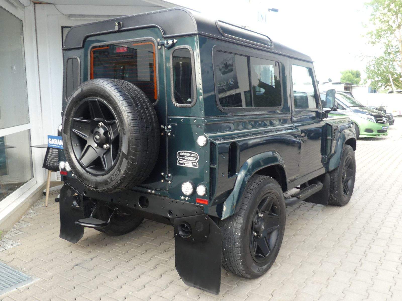 LAND ROVER Defender 90 E Kahn-Design Kam. Navi Klima Bluet.