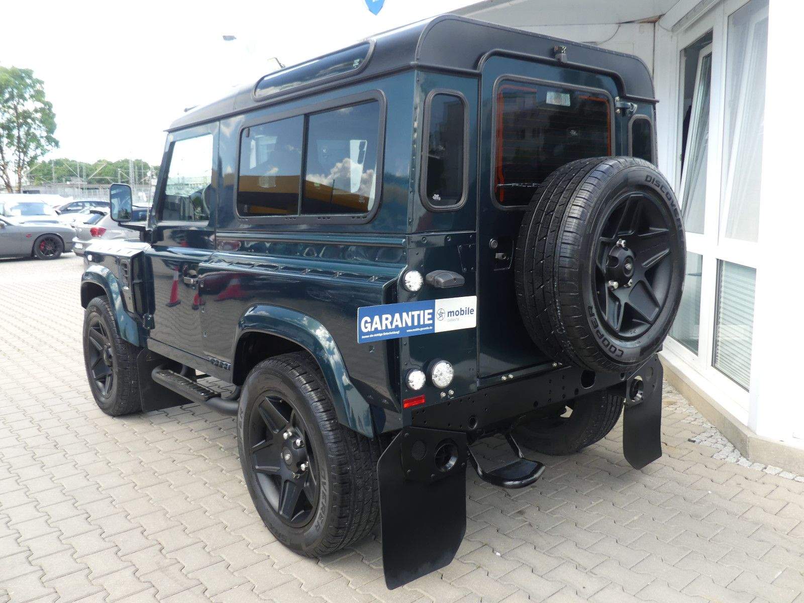 LAND ROVER Defender 90 E Kahn-Design Kam. Navi Klima Bluet.